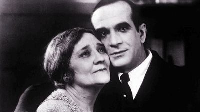 The Jazz Singer (1927) Actor Al Jolson as Jakie Rabinowitz with Eugenie Besserer, who plays his mother as Sara Rabinowitz in a scene from the musical film directed by Alan Crosland. First feature-length movie with synchronized dialogue.  The Jazz Singer