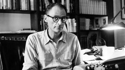 Playwright Arthur Miller works on a new play at his typewriter in the study of his New York apartment on July 21, 1959.