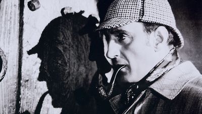 British actor Basil Rathbone, as Detective Sherlock Holmes who he portrayed in several movies based on the detective created by Arthur Conan Doyle.