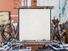 Blank canvas in an artist's studio. Art; oil paints; brushes; artists' tools