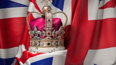 Royal golden crown with jewels on British flag. Symbols of United Kingdom. (British royalty, British monarchy)