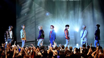 South Korean music group BTS performs onstage during the 2017 American Music Awards at Microsoft Theater on November 19, 2017 in Los Angeles, California. (K-pop, K pop, music, boy bands)