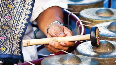 Gong. Closeup of a khong wong gong circle chime. Thai classical musical instrument, part of piphat ensemble. (percussion, music)