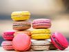 Macaron. Colorful stack of macaron pastries on a table. Sweet meringue-based confection made with egg white, icing sugar, almond powder and food clothing. Food, French cuisine, dessert, pastries, cookies