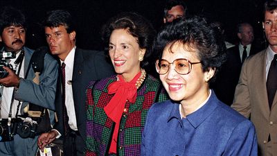 Philippine President Corazon Aquino (b. Maria Corazon Cojuangco) greets officials in airport terminal. Andrews Air Force Base, U.S., Maryland September 15, 1986. President of the Philippines 1986-1992.