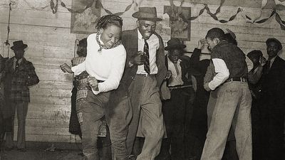 Dancers performing the jitterbug at a juke joint outside Clarksdale, Miss., 1939.