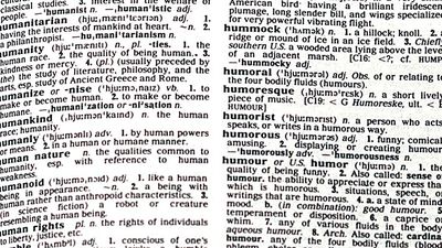 Pages of a dictionary from England (English dictionary, British dictionary, United Kingdom, words, opened book.