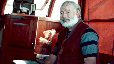 Ernest Hemingway aboard the boat "Pilar", off Cuba. Ernest Hemingway American novelist and short-story writer, awarded the Nobel Prize for Literature in 1954.