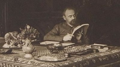 French author Emile Zola in his office on rue de Bruxelles, Paris, France; undated.