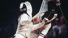 Giovanna Trillini (rear) of Italy successfully defending her world champion foil title against Wang Huifeng of China at the 1992 Olympics.