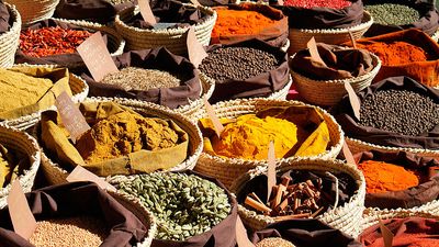 Spice and herb. Herbs. Spices. Food. Baskets of herbs and spices on display at a market stall, France.