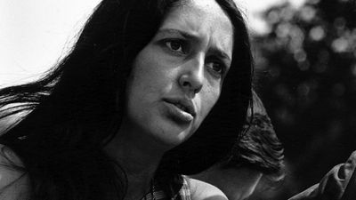 American singer and political activist Joan Baez performing at the Civil Rights March on Washington, D.C., August 28, 1963. Photo by Rowland Scherman. See Content Notes.