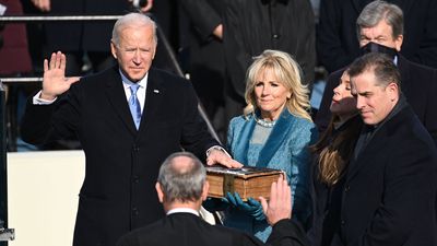 President-elect Joe Biden is sworn in as his wife Jill Biden holds the Bible during the 59th Presidential Inauguration at the U.S. Capitol on January 20, 2021 in Washington, D.C. (presidents, presidency)