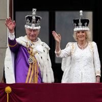 King Charles III and Queen Camilla (Camilla, Queen Consort) wave from the balcony of Buckingham Palace during the Coronation of King Charles in London, England on May 6, 2023