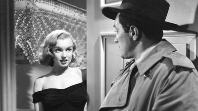 Asphalt Jungle (1950) Movie scene of actress Marilyn Monroe as Angela Phinlay in an early film career appearence with actor Sterling Hayden as Dix Handley in movie directed by John Huston.