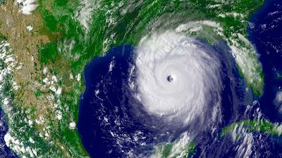 NOAA satellite image of Hurricane Katrina taken onaugust 28, 2005. On August 28, 2005, Hurricane Katrina was in the Gulf of Mexico where it powered up to a Category 5 storm on the Saffir-Simpson hurricane scale packing winds estimated at 175 mph.