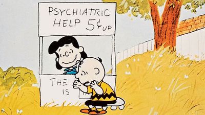 A Boy Named Charlie Brown (1969) Lucy van Pelt gives Charlie Brown, seated, psychiatric advice in a scene from the animated film directed by Bill Melendez. Animated movie. Comic strip Peanuts. Charles Schulz